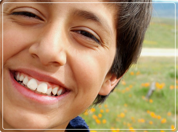 photo of young boy smiling