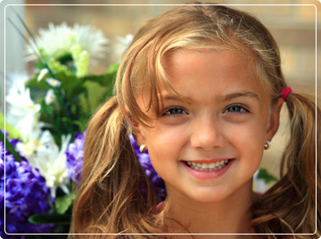 photo of young girl smiling